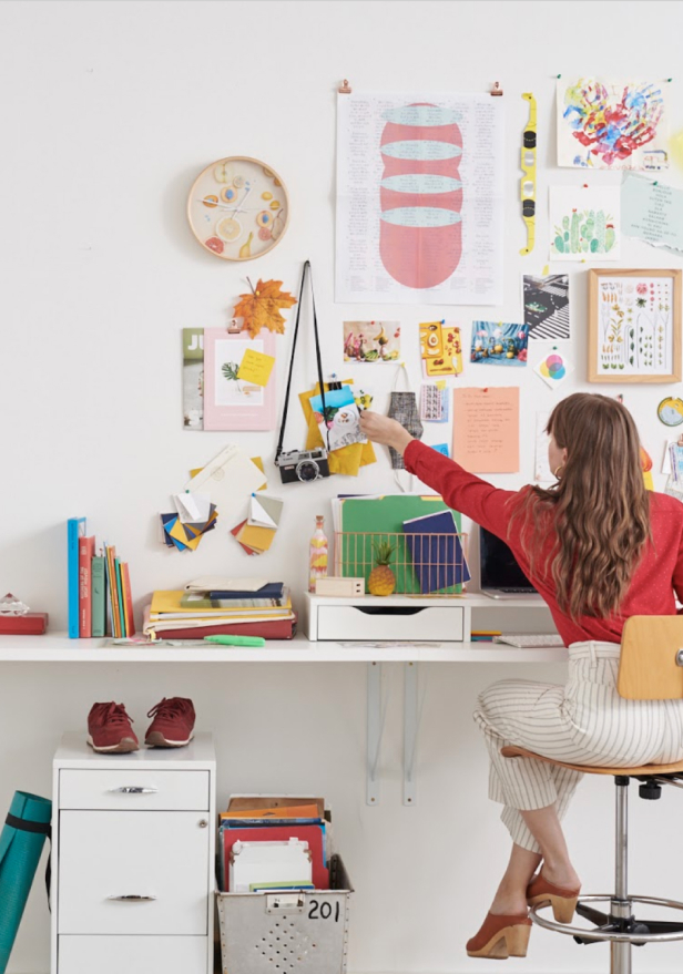 Person working diligently from their desk
